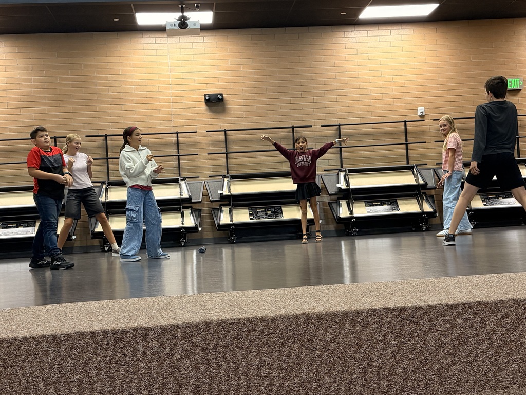 Students performing on stage