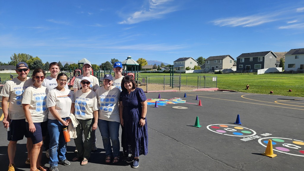 Mrs. Findlay and the United Way volunteers on the playground