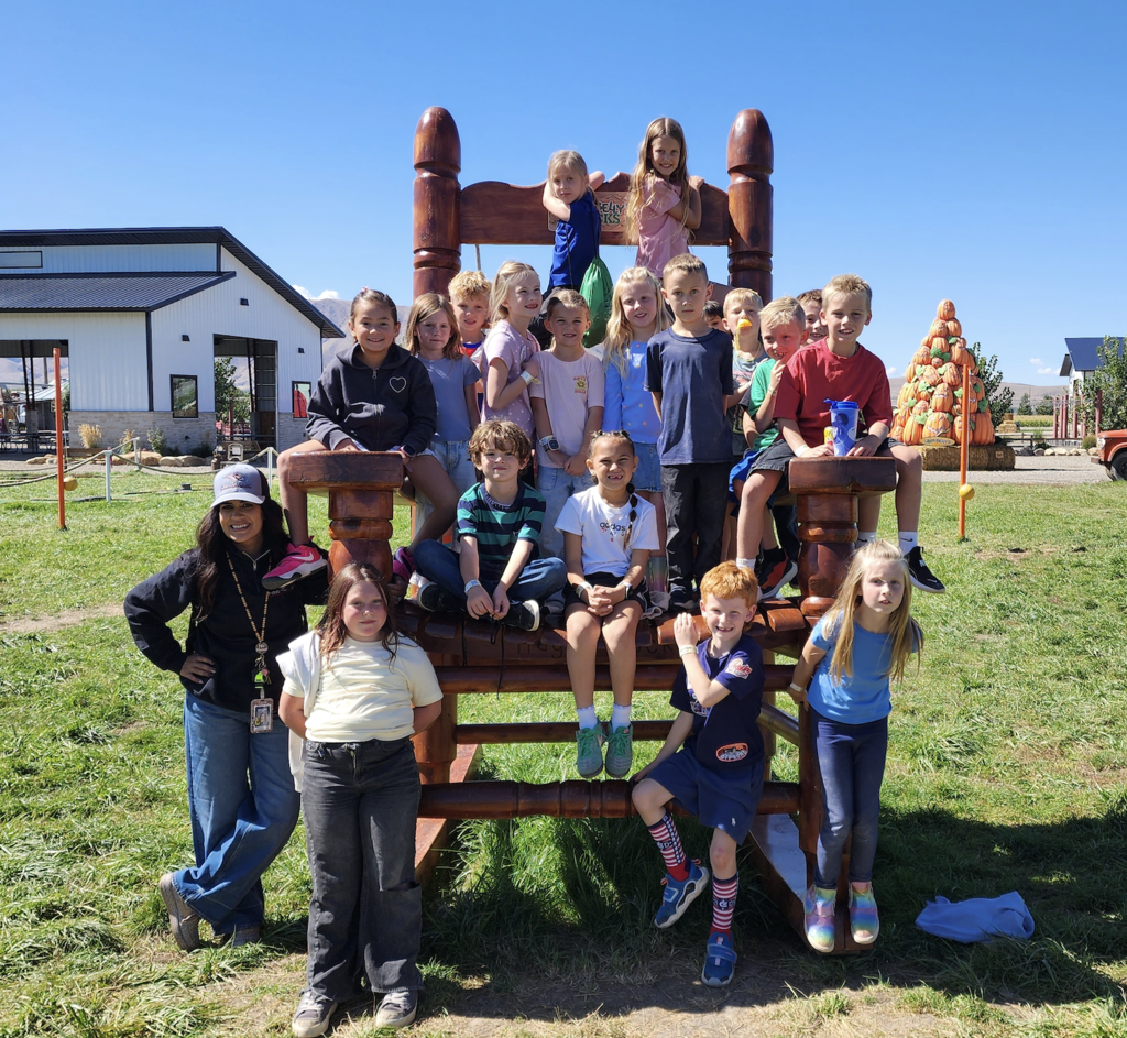 Students enjoying a variety of fun activities and attractions during their visit to Cornbelly’s.