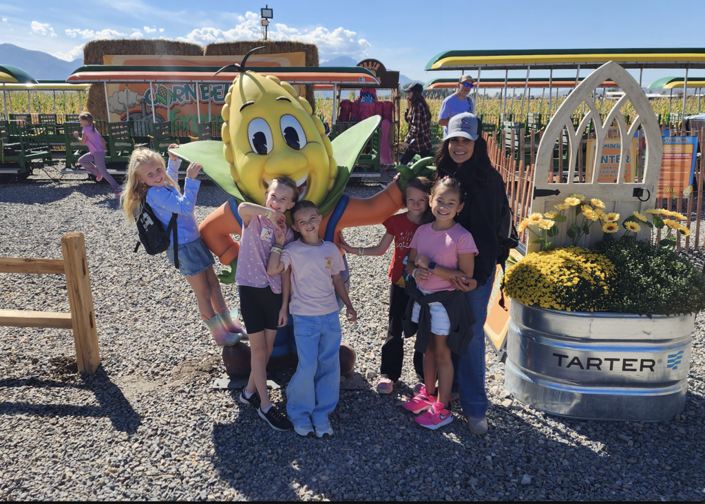 Students enjoying a variety of fun activities and attractions during their visit to Cornbelly’s.