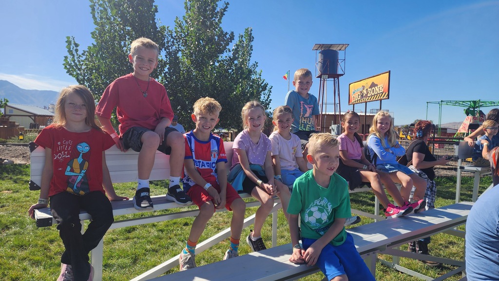 Students enjoying a variety of fun activities and attractions during their visit to Cornbelly’s.