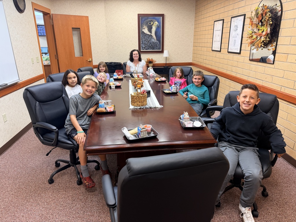 September PrinciPALS Lunch Club- Kids sitting around table with Mrs. Stoddard eating Lunch