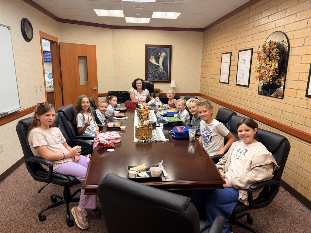 September PrinciPALS Lunch Club- Kids sitting around table with Mrs. Stoddard eating Lunch