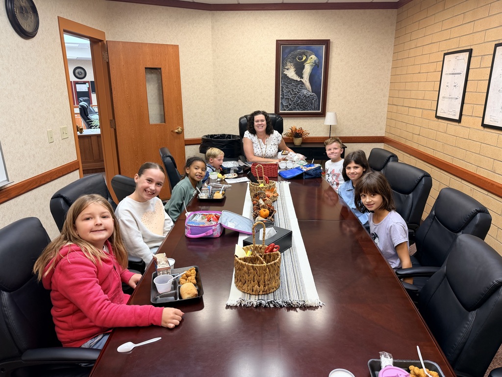 September PrinciPALS Lunch Club- Kids sitting around table with Mrs. Stoddard eating Lunch