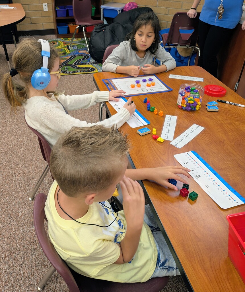 students using tools to learn math 