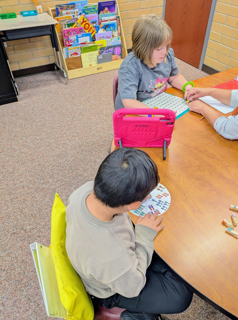 students using tools to learn math 