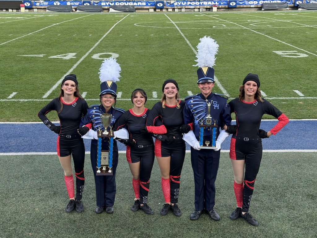 Band members accept their trophies.