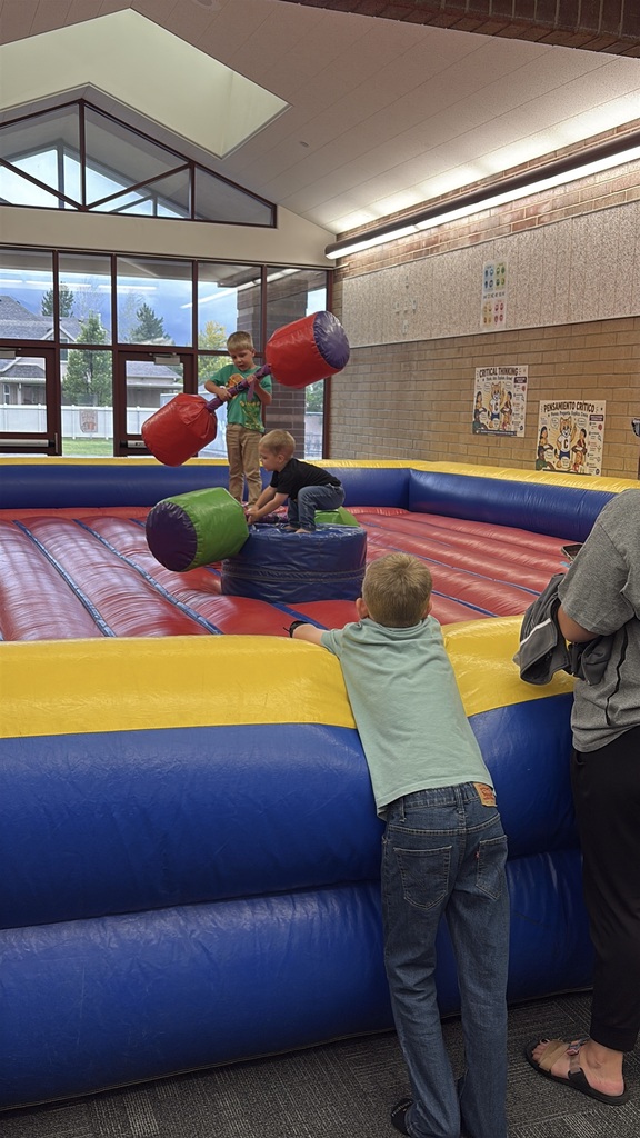 students jousting