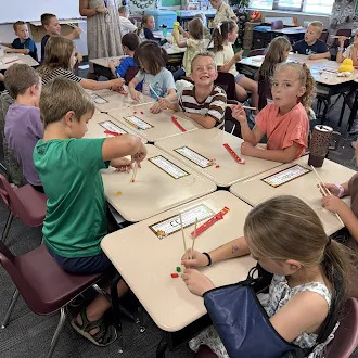 kids using chopsticks