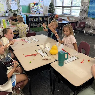 kids using chopsticks