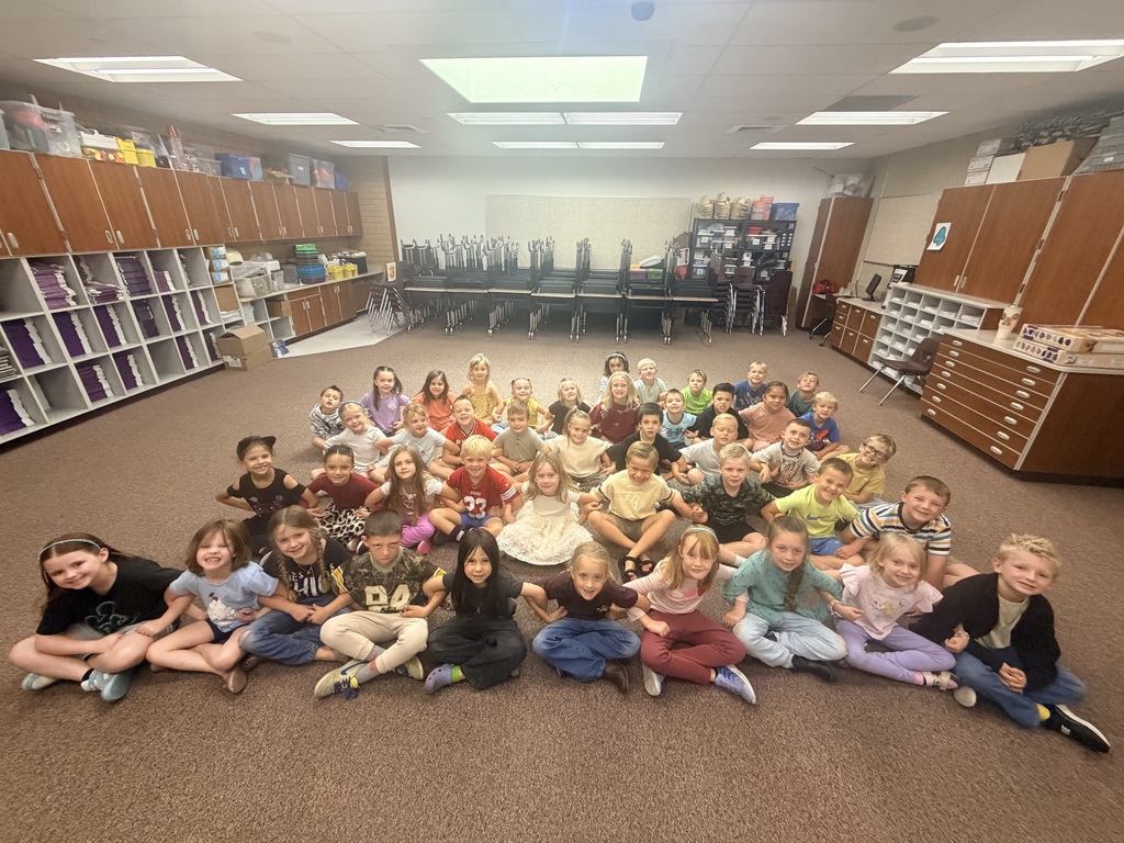 Students participating in a Falcon Flight lesson by playing Four Corners, talking with classmates, and building connections with other Falcons.