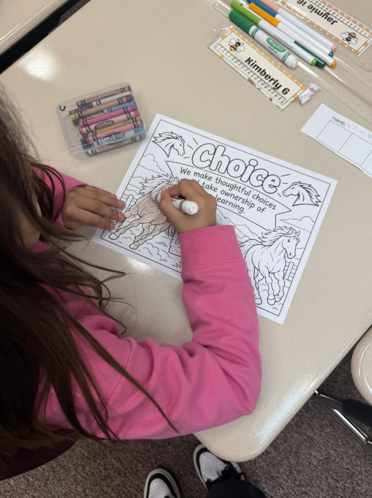student coloring a "choice" coloring page
