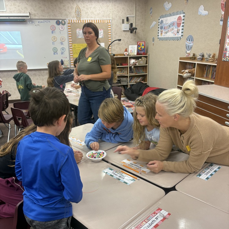 Mrs. Esplin’s class making friendship bracelets.