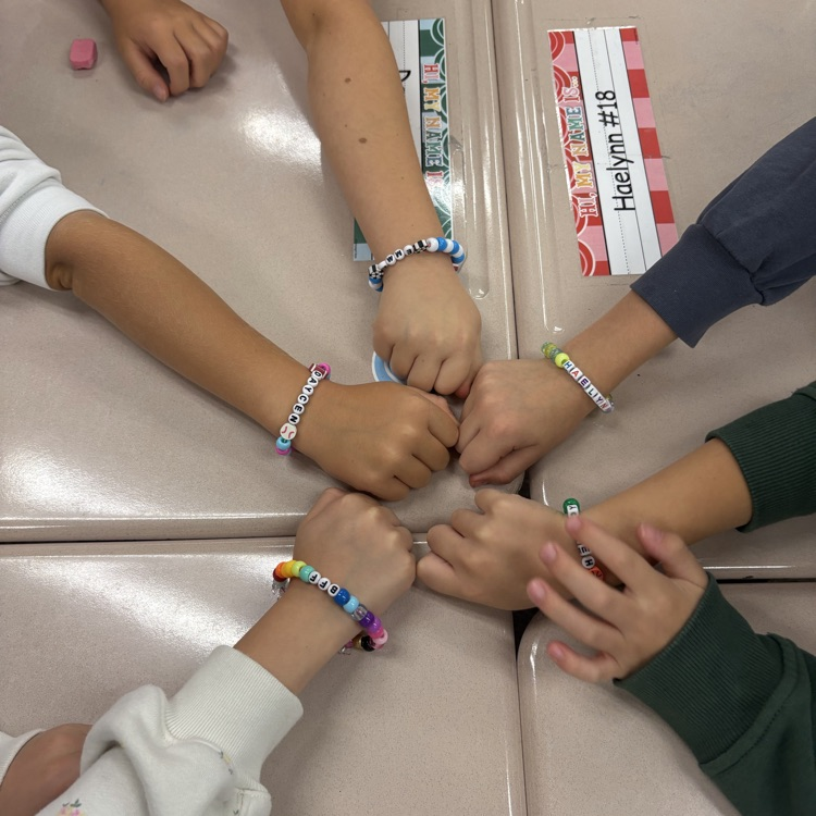 Mrs. Esplin’s class making friendship bracelets.