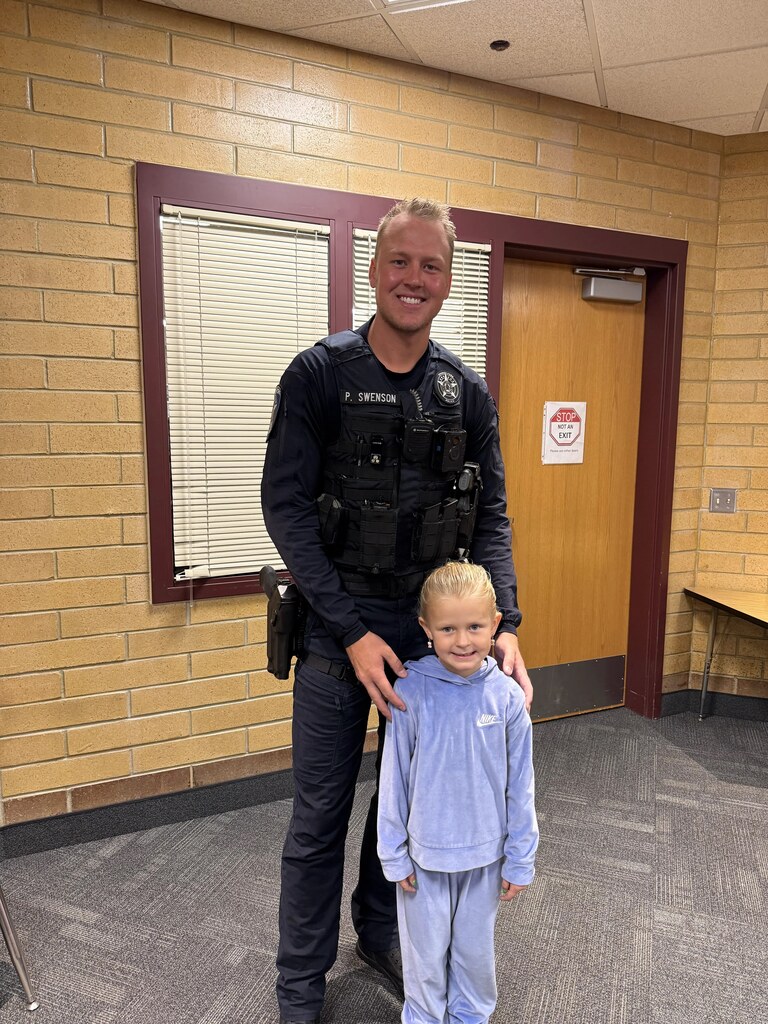 Officer Swenson with a student