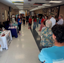 Families lining up for backpacks and supplies