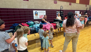 Families receiving backpacks