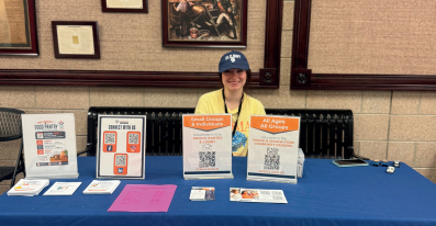 Volunteer at a table