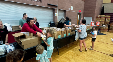 Families getting backpacks