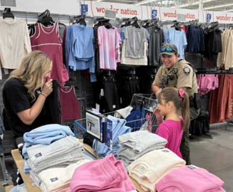 Cop shopping with kid