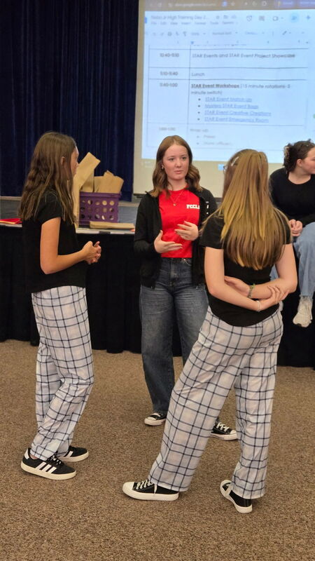 Junior High FCCLA members learn from a Maple Mountain High FCCLA officer.