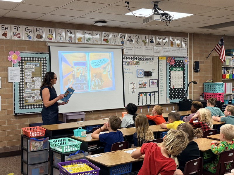 Mrs. Valerio Reading to a class