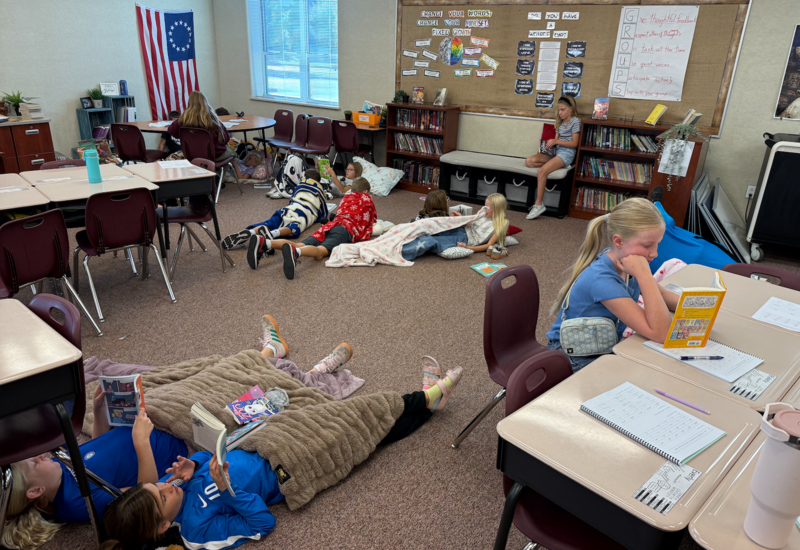 students reading all over the classroom