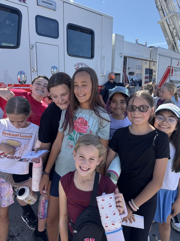students outside fire truck