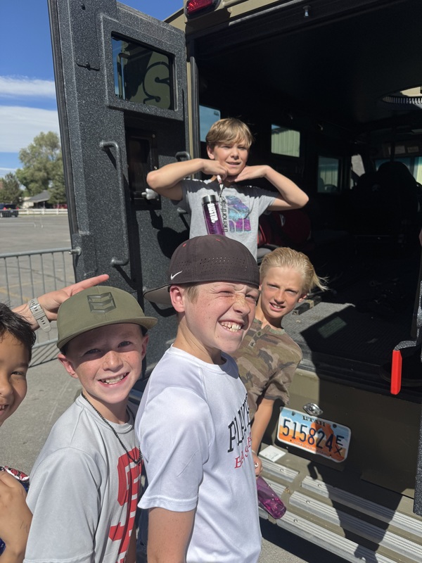 students outside a fire truck