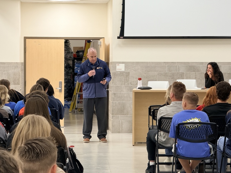 Everett Kelepolo speaking to the team captains