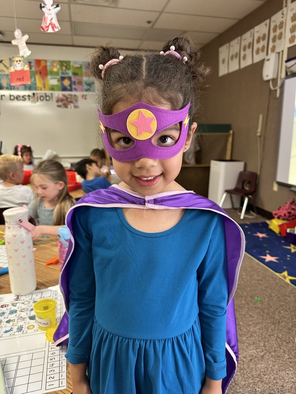 girl dressed a super hero