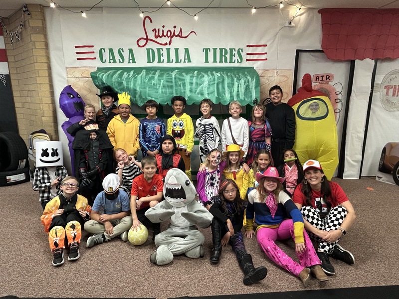 Kids in Halloween costumes