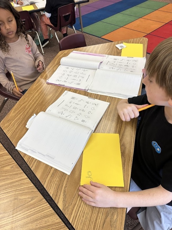 First grade practicing hieroglyphics 