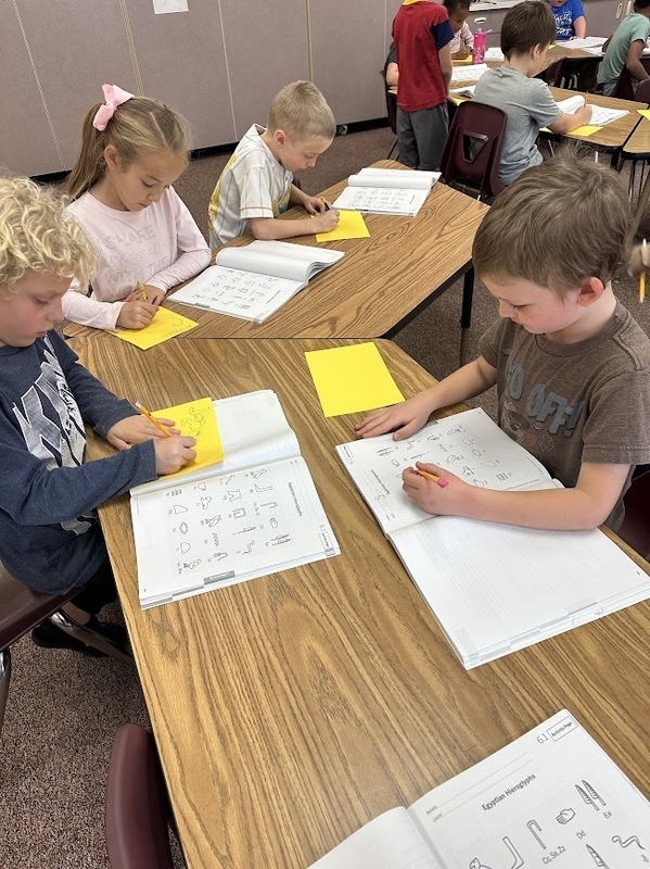 First grade practicing hieroglyphics 