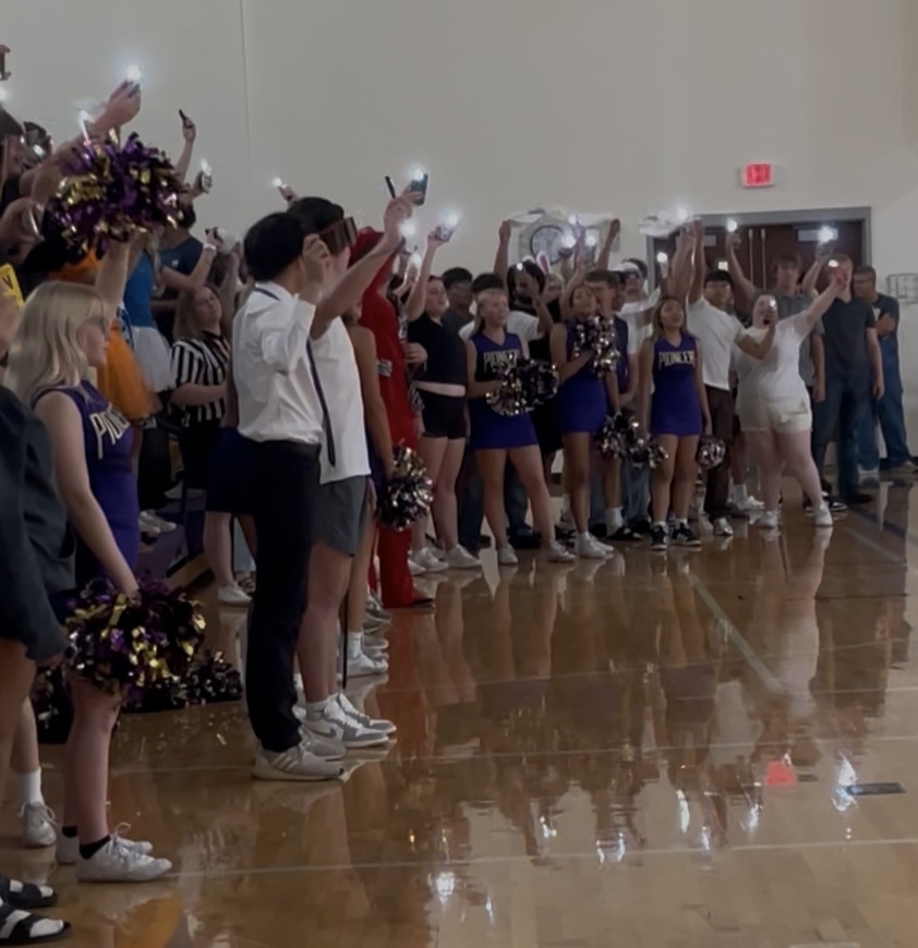 Cheering section in the dark