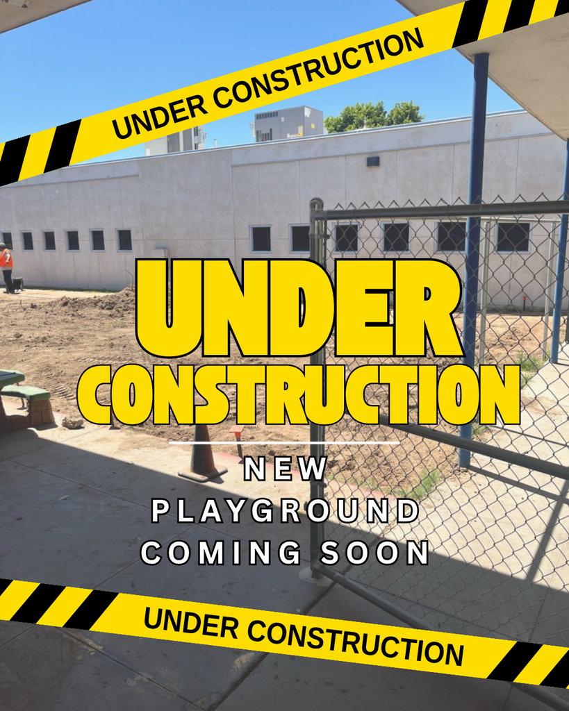 Promotional graphic showing a construction area enclosed by a chain-link fence with a partially completed building in the background. Yellow and black caution tape graphics across the top and bottom display the words "UNDER CONSTRUCTION." Large yellow text in the center reads "UNDER CONSTRUCTION," with smaller white text below stating, "NEW PLAYGROUND COMING SOON." A construction worker and dirt work are visible on the left side, indicating playground construction is in progress.