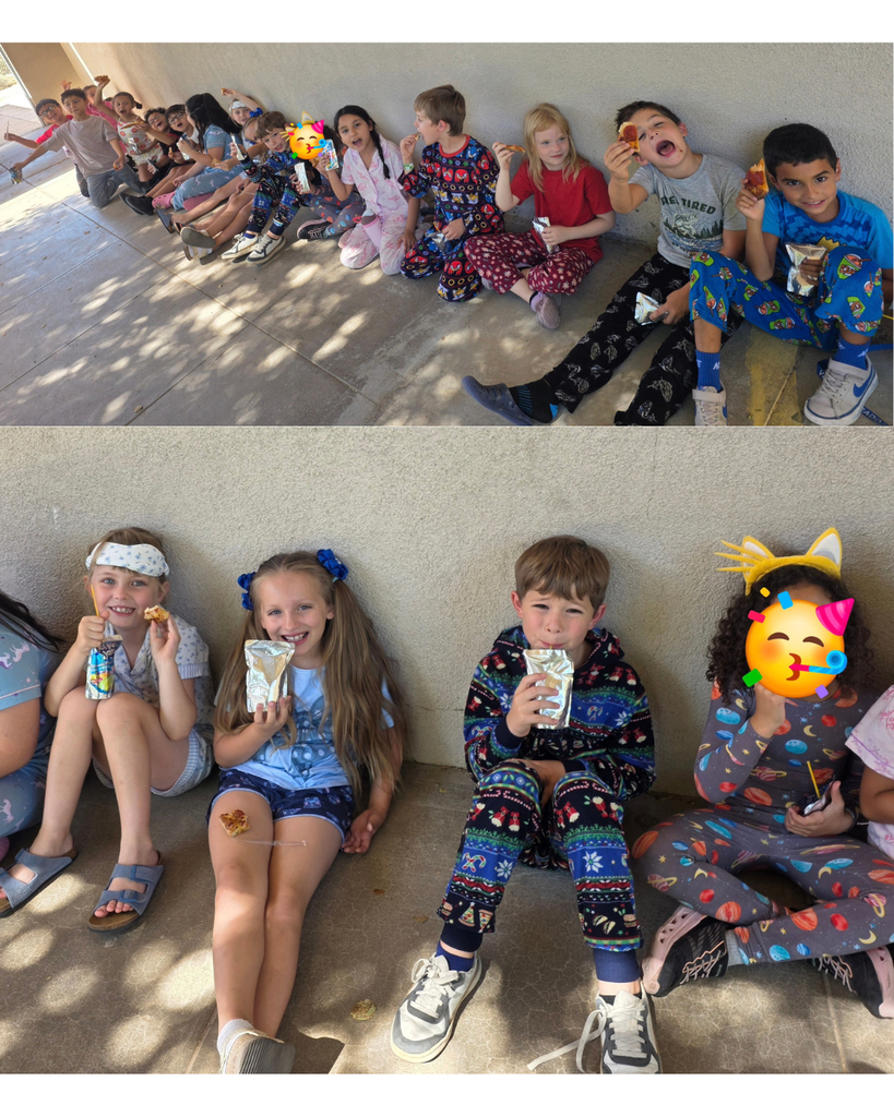 Students outside eating a pizza party.