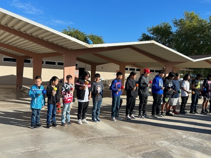 students dancing and singing