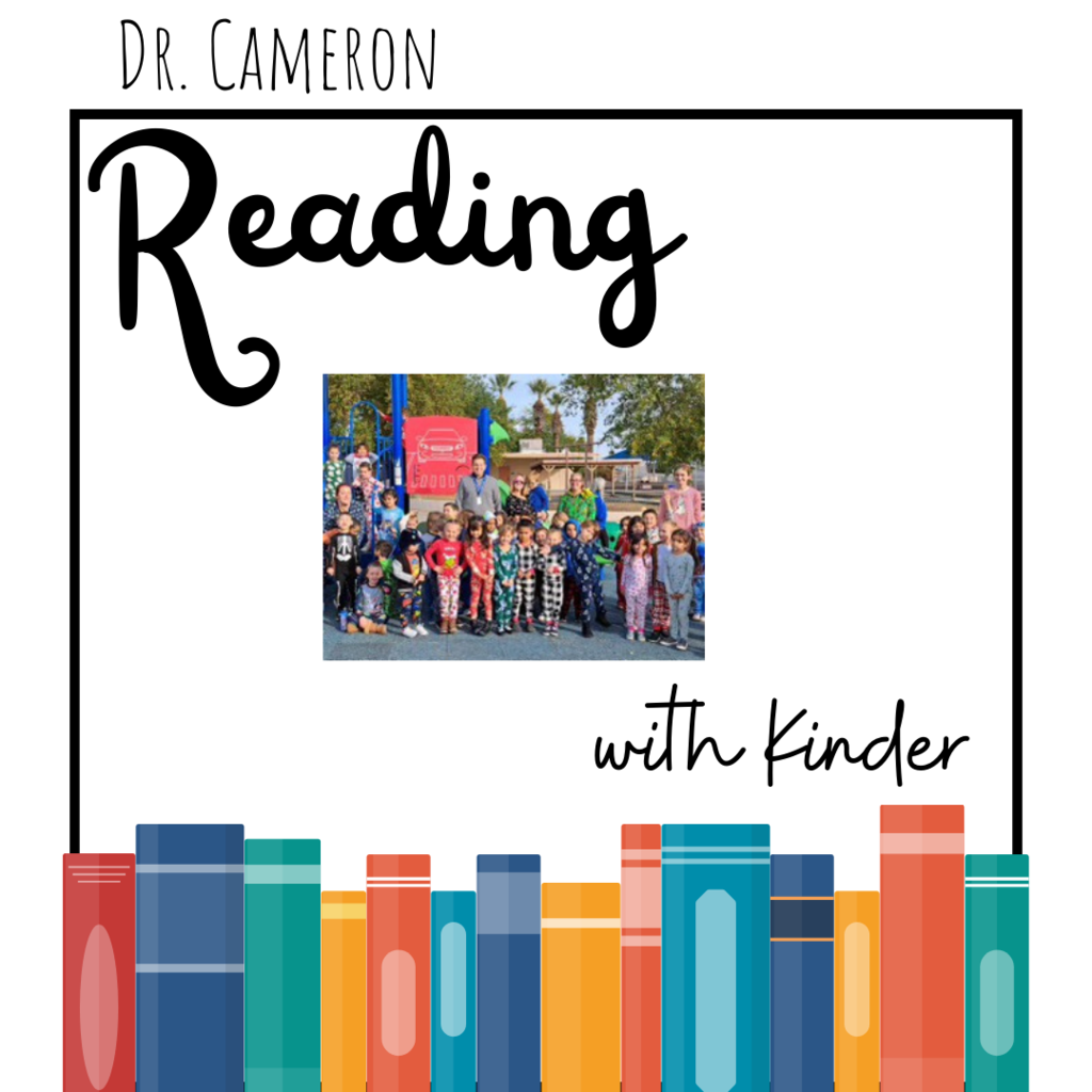 Dr. Cameron posing with students.