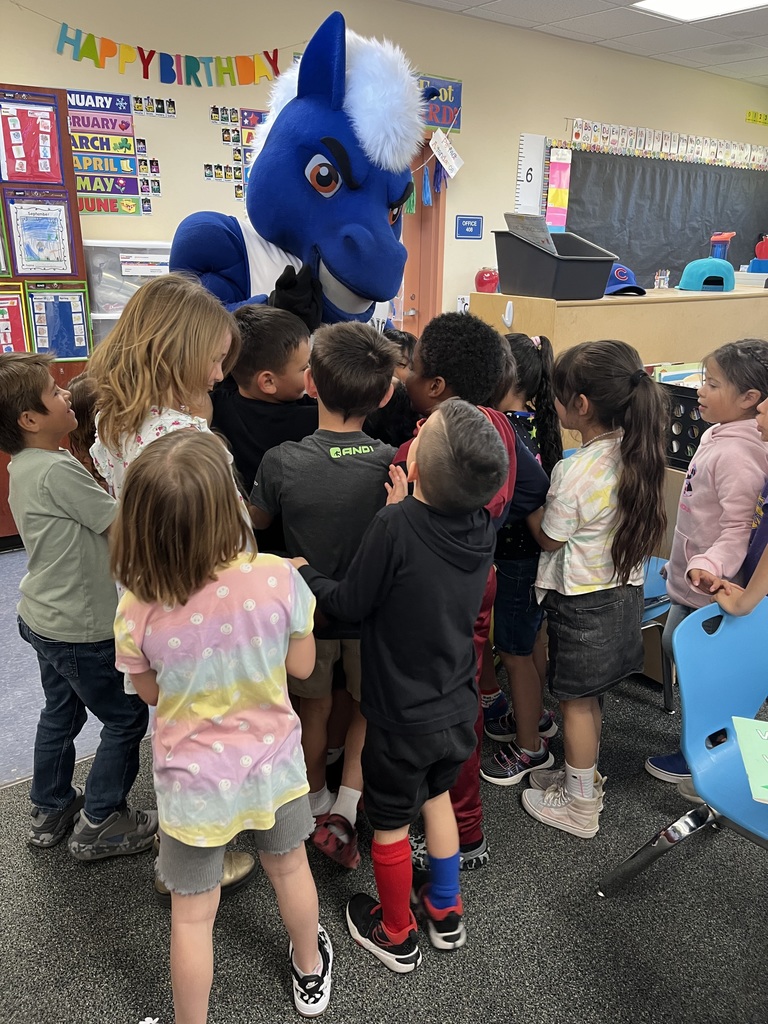 Mascot with students.
