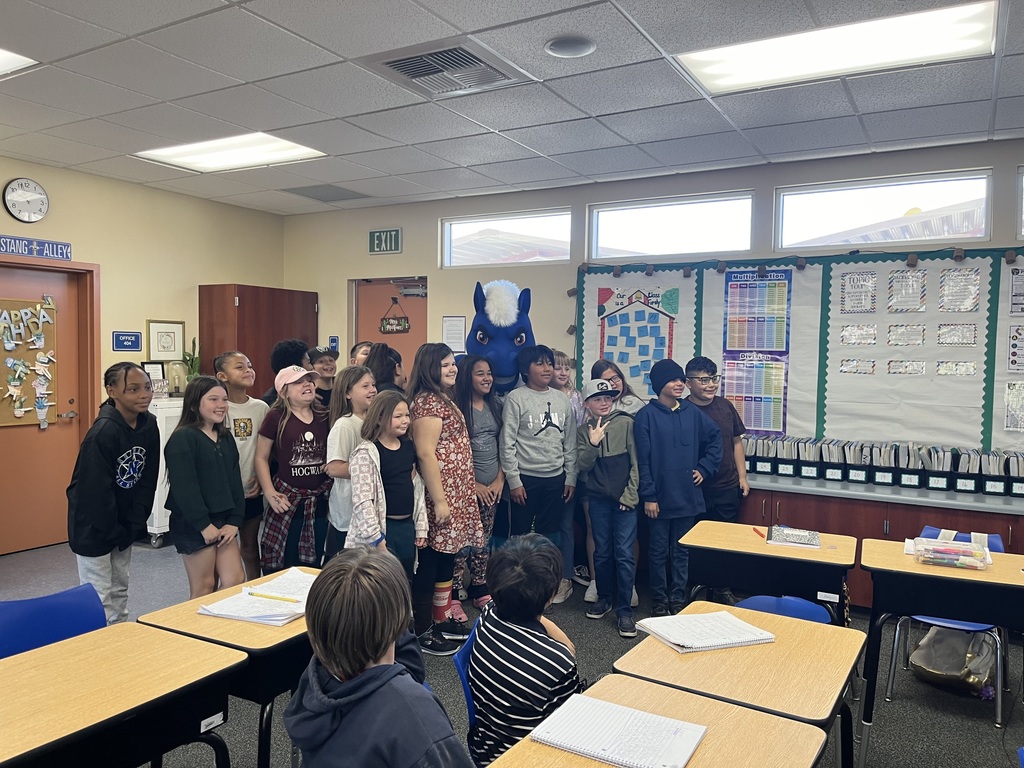 Mascot with students.