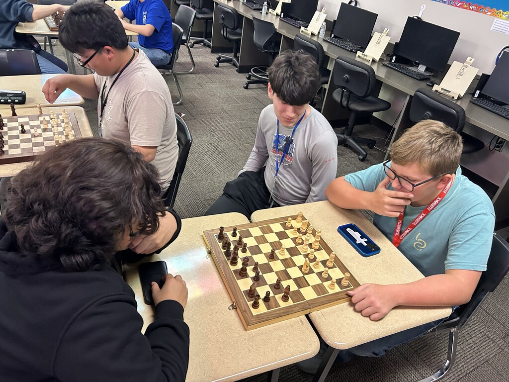 Students playing chess