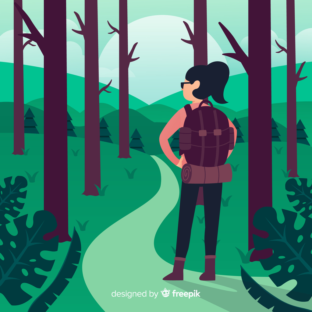 image from Freepik of female hiker walking a trail in the forest