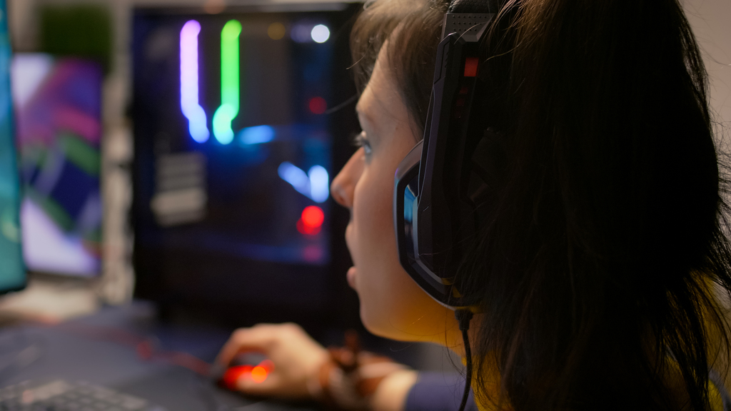 Image by DC Studio on Magnific - photo in profile of a student using a gaming computer