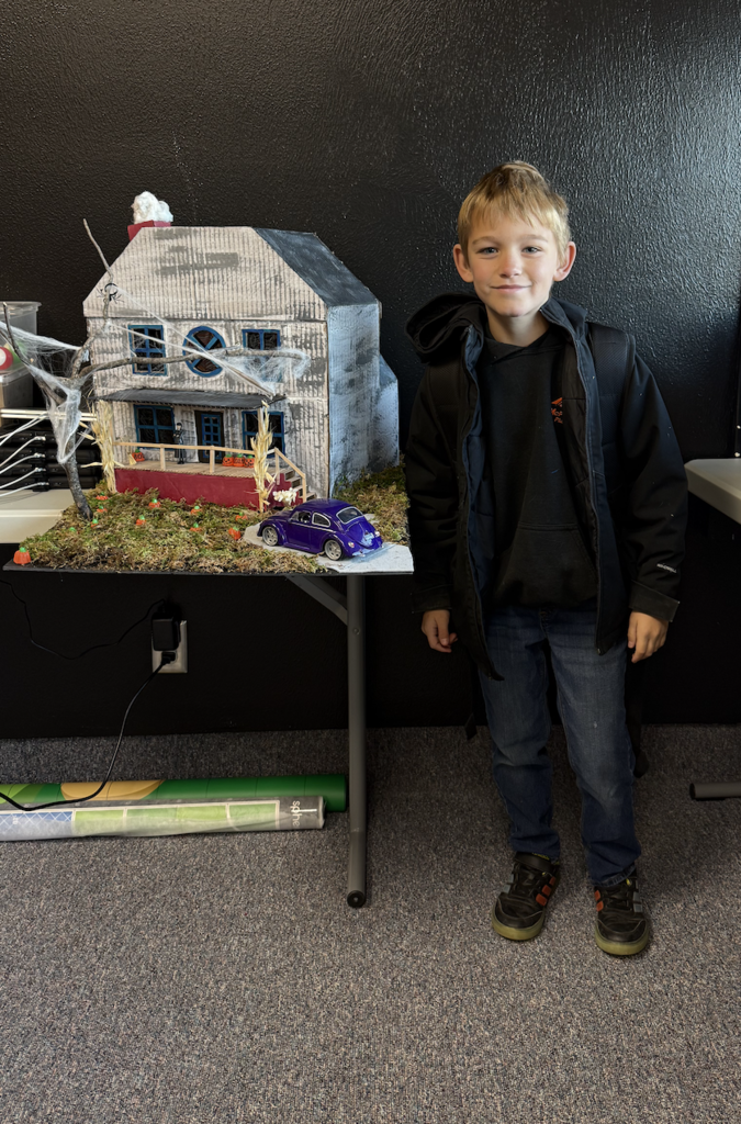 4th grader with his haunted house