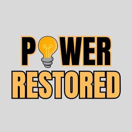 Graphic reading “POWER RESTORED” in bold black and yellow lettering, with a glowing yellow light bulb replacing the “O” in “POWER,” on a light gray background.