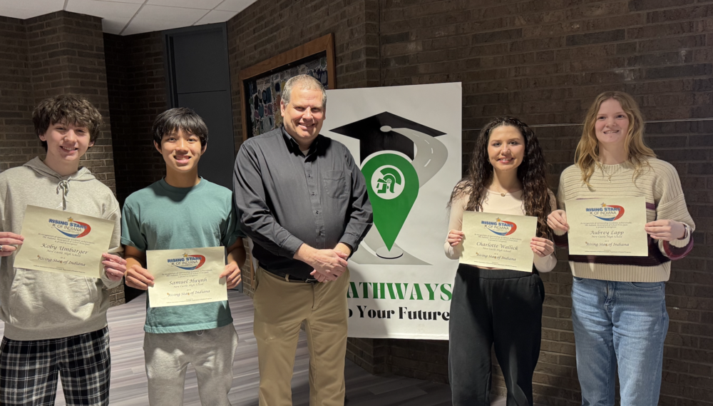 Rising Stars of Indiana NCHS Juniors with Principal Amman