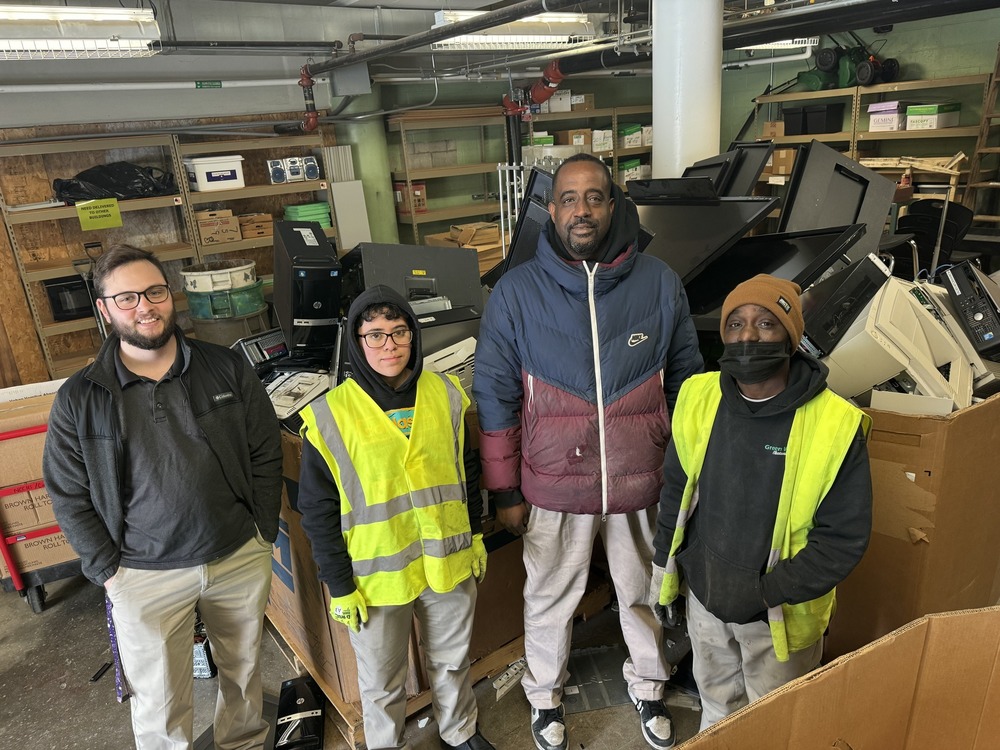 staff members in a recycling facility