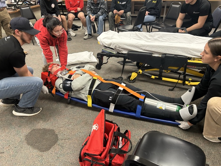 "Future EMTs in action! Practicing backboard skills today to perfect teamwork, communication, and patient care. Every drill brings us closer to saving lives. 🚑 #EMTTraining #FutureHeroes"