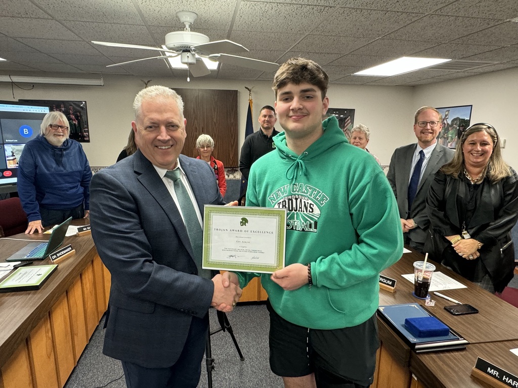 Coy Adkins and Dr. Shoemaker with Trojan Award of Excellence